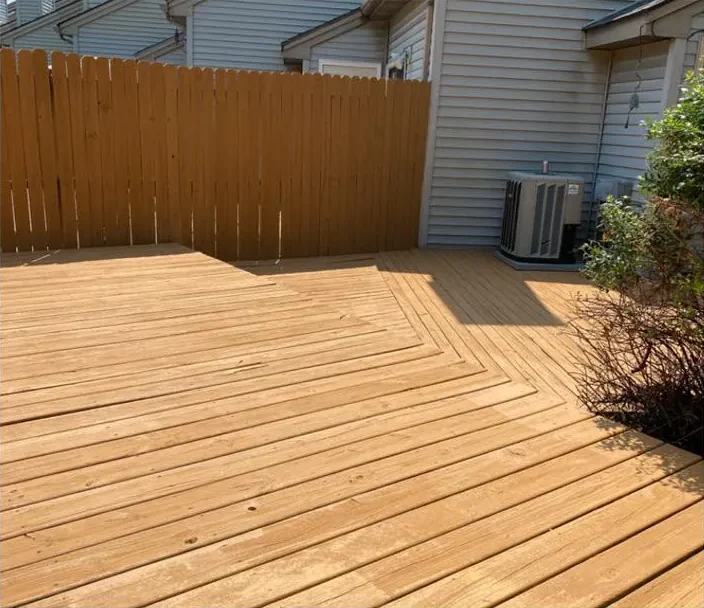 After: the deck cleaned, cleared and stained